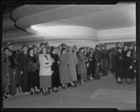 Attendees of the Philadephia Orchestra's concert wait outside the Pan Pacific Auditorium, Los Angeles, 1936