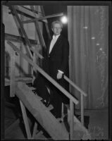 Leopold Stokowski stands backstage, Los Angeles, 1936