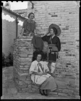 Betty Hagerman, Betty Jones, and Patricia Huddleson show some Mexican fashions, Los Angeles, 1935-1936