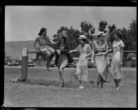 Polly Forsyth, Gladys Turner, Virginia Demory, Elsie Bakewell, and Mary Frink plan a ball, Santa Barbara, 1936