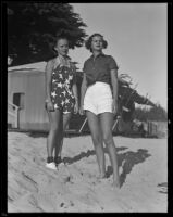 Beverly Ricks and Marion Pfau look for a place to suntan, Santa Barbara, 1936