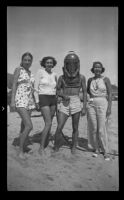 Lois Earl, Mrs. Jack Gunnerson, and Agnes Derby are given diving instructions by E. J. Dirking, Emerald Bay, Laguna Beach, 1936