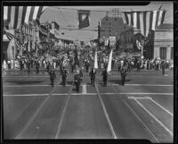 American Legion parades through the Hollywood and Highland intersection during their convention, Los Angeles, 1936