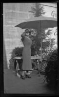 Joseph (Joe) V. Smith posing in a dress, hat, and heels, Los Angeles, 1936
