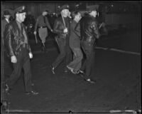 Protester John Bulnarski arrested during L. A. Railway strike, Los Angeles, 1934