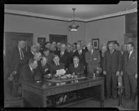 Samuel Moody Haskins, P. B. Harris, and officials discuss railway strike negotiations, Los Angeles, 1934
