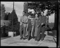 L. B. McElroy, Harriett Eads, Lorraine Eads, and Charles Warren prepare to go horseback riding, Lake Arrowhead, 1936