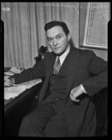 Walter Lippmann at his desk, Los Angeles, 1936