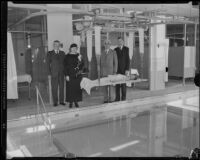 Dr. Guy Cochran, Mrs. Kate Crutcher, Joseph Scott, Dr. John Wilson and James Croft pose at the new therapy pool at the Childrens Hospital, Los Angeles, 1934
