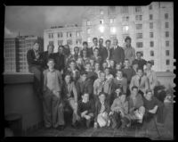 Newsboys on a rooftop terrace, Long Beach, 1939