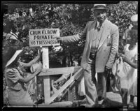 Father Divine points to a sign reading "Crum Elbow, Private, No Tresspassing," Dutchess County, New York, 1938