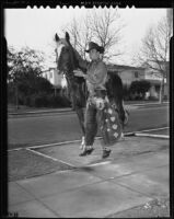 Worth Crouch, stuntman, with his palomino, Thunder, Los Angeles, 1938