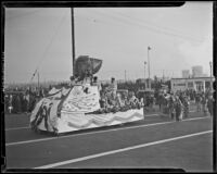 Decorated float carrying Catholic girls and priests, Calexico (?), 1939