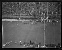 Columbia Lion carries the football during the Rose Bowl Game against Stanford, Pasadena, circa 1934