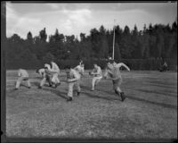 Stanford football team runs through drills prior to the Rose Bowl, Pasadena, circa 1934