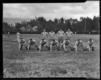 Players from the Rose Bowl-bound Stanford football team pose during practice, Pasadena, 1934