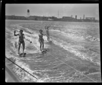 Veda Stanley, Ginny Nollenberger, and Bee Mitchell aquaplaning, Hermosa Beach, 1946