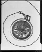 Watch in a glass case at the Brock & Company jewelry and gift store, Los Angeles, 1928-1938