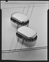 Men's sterling silver hair brushes at the Brock & Company jewelry and gift store, Los Angeles, 1928-1938