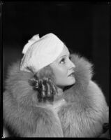 Evalyn Knapp, actress, modeling a hat, circa 1932-1934