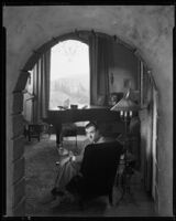 Fred Keating, actor, in  his Hollywood Hills house "Casa Escrow," Los Angeles, circa 1934