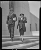 Michael Bartlett, baritone and actor, aand Martha Tibbetts, actress, in front of the Hollywood Post Office, Los Angeles, 1936