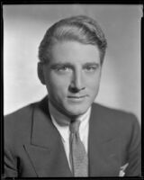 Man wearing a jacket and tie, circa 1926-1939