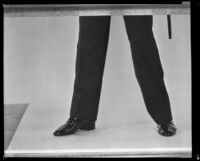 Man's feet and legs, copy print, circa 1926-1939