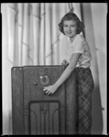 Barbara Read, actress, with a radio, circa 1934-1936