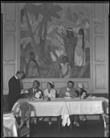 Waiter taking the order of a man, woman, Lyle Talbot, actor, and another woman in the dining room of the Del Monte Lodge, Pebble Beach, circa 1932-1939