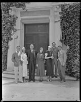 Group of people with Lyle Talbot, actor, at the far right, standing in front of the Del Monte Lodge, Pebble Beach, circa 1932-1939