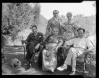 Joseph Schildkraut, actor, sitting with his mother, Erna, his wife, Marie, Rabbi Edgar F. Magnin, and another man, circa 1934