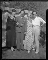 Woman and a man posing with Marie Schildkraut, and her husband, Joseph Schildkraut, actor, circa 1934