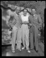 Joseph Schildkraut, actor, standing between two men, circa 1934