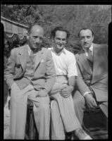Joseph Schildkraut, actor, sitting between two other men, circa 1934