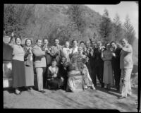Joseph Schildkraut, actor, standing in a group raising a toast, circa 1934