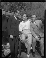 Joseph Schildkraut, actor, sitting between Rabbi Edgar F. Magnin and another man, circa 1934