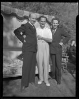 Joseph Schildkraut, actor, posing between two other men, circa 1934
