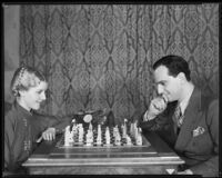 Joseph Schildkraut, actor, playing chess with his wife, Marie, circa 1934