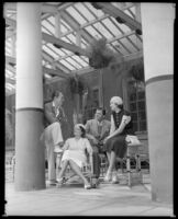 Man, woman, Lyle Talbot, actor, and another woman by the Roman Plunge at the Hotel Del Monte, Monterey, circa 1932-1939