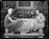 Woman and Louise Stanley, actress, sitting on a bench, Claremont, circa 1938