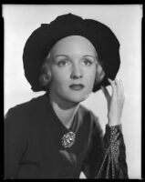 Virginia Pine, actress, modeling a hat, circa 1934-1935