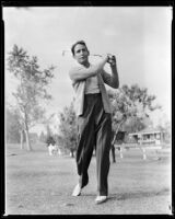Victor Jory, actor, swinging a golf club, circa 1933-1939