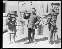 Three Tibetan boys carrying water, circa 1932-1936 (Photograph used as research for Lost Horizon)
