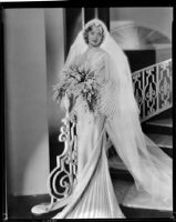 Marian Marsh, actress, wearing a wedding dress, circa 1935-1939