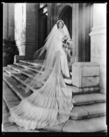 Marian Marsh, actress, wearing a wedding dress, circa 1935-1939