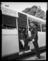 George Murphy, actor, stepping onto a tour bus at the California Pacific International Exposition, San Diego, 1935
