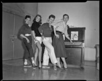 Female dancers and a piano player during rehearsals for All Ashore, circa 1953
