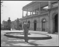 Mel Ferrer, actor, in a courtyard at Castillo de Chapultepec, Mexico City, circa 1950
