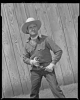 Gene Autry with pistol in hand, as he appeared in Blue Canadian Rockies, circa 1952